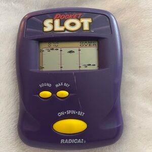 Radica vintage 1997 Pocket Slot portable handheld casino game purple tested.